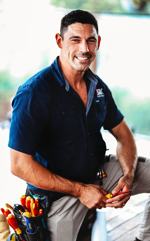 Brodie from Brix Electrical & Air holding electrical tools