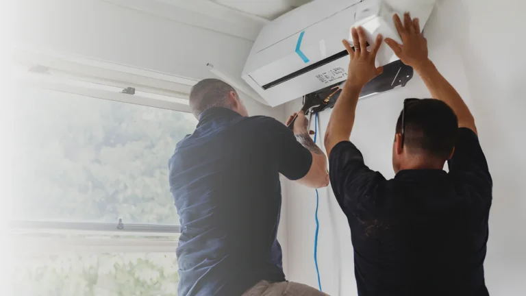 Brix Electrical & Air technicians installing a split system air conditioner in a home